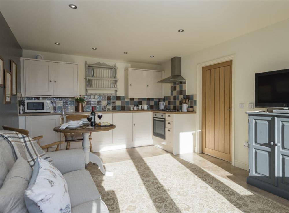 Open plan living space at Cow Pasture Cottage in South Elkington, near Louth, Lincolnshire
