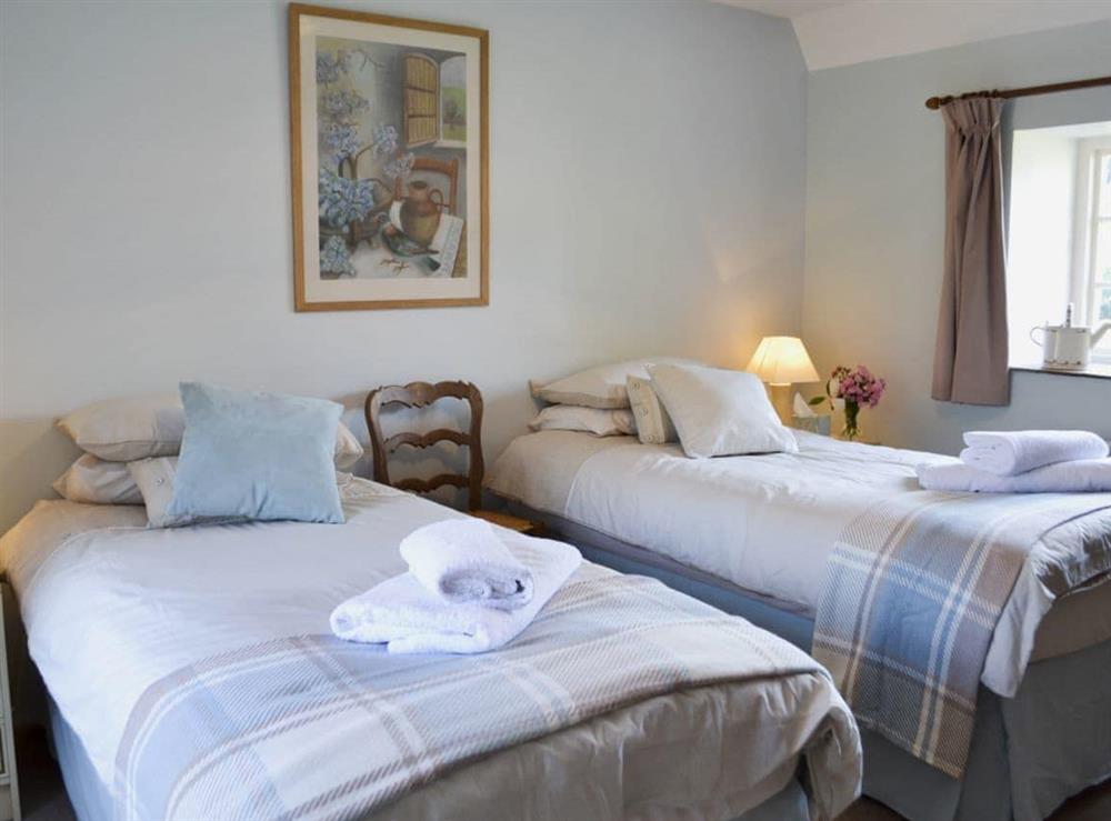 Twin bedroom at Cowbeech Farm Cottage in Cowbeech, near Hailsham, East Sussex