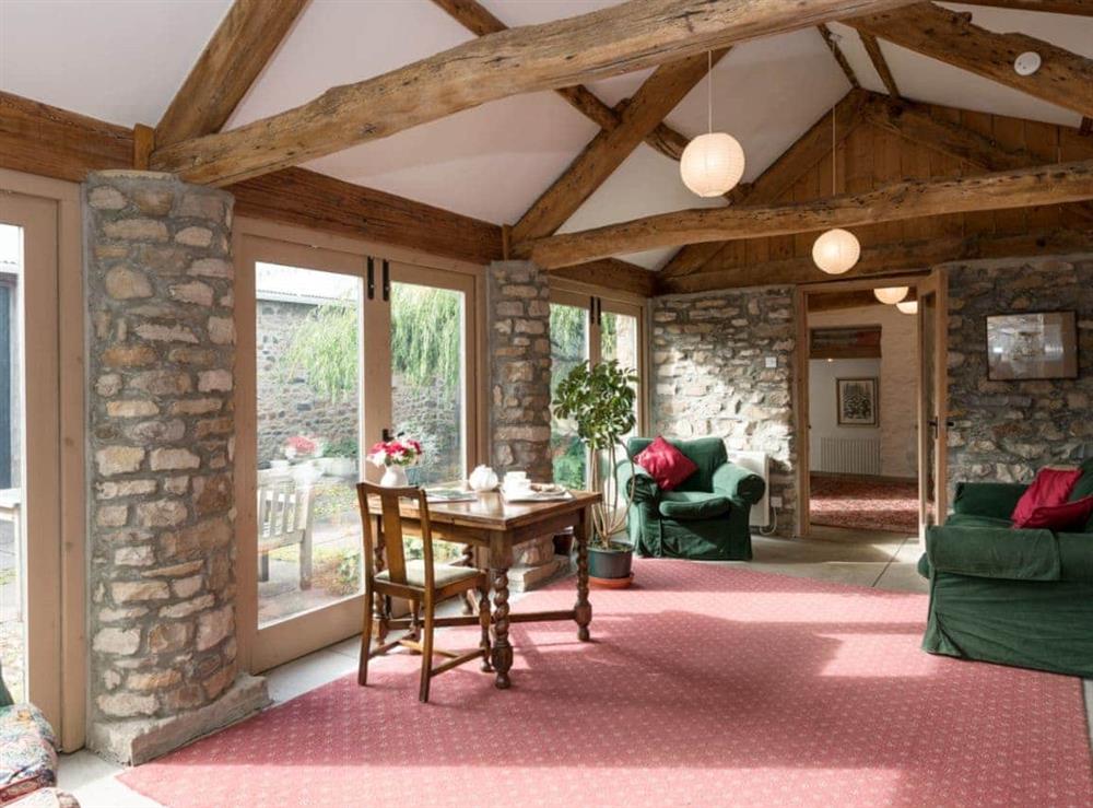 Additional sitting room with French doors to patio at Cowdber Barn in Burrow, Kirkby Lonsdale, Cumbria., Lancashire