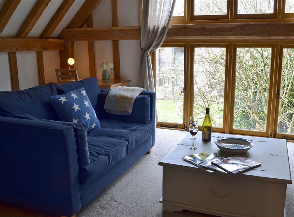 Beautifully presented living room with beams at Cowford Oast in Eridge Green, near Tunbridge Wells, Sussex, East Sussex