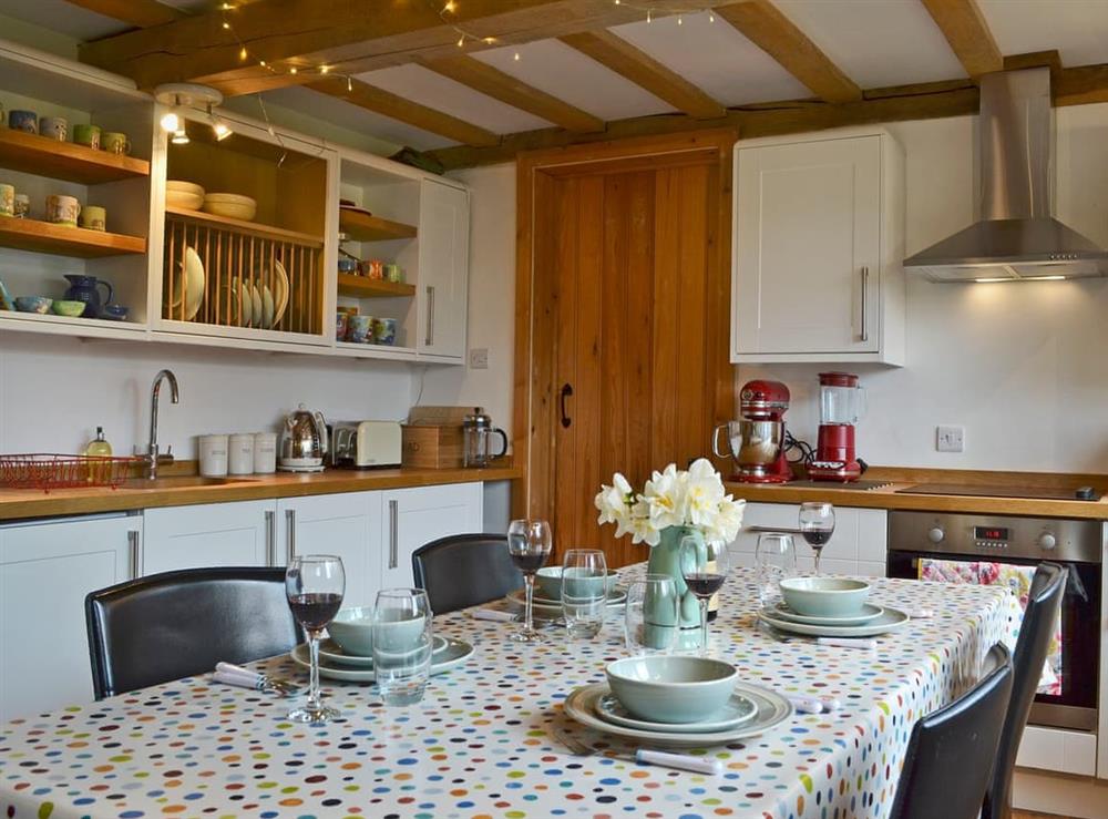 Stylishly furnished kitchen/dining room with beams at Cowford Oast in Eridge Green, near Tunbridge Wells, Sussex, East Sussex