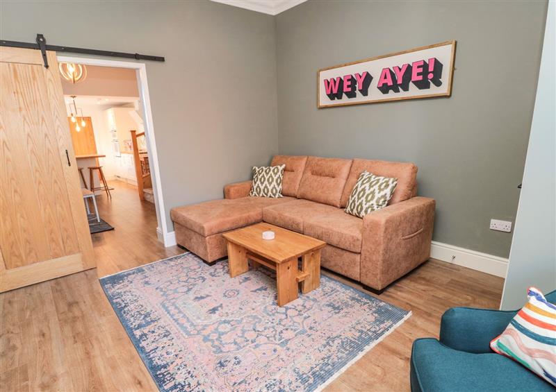 Enjoy the living room at Cowrie Cottage, Cullercoats