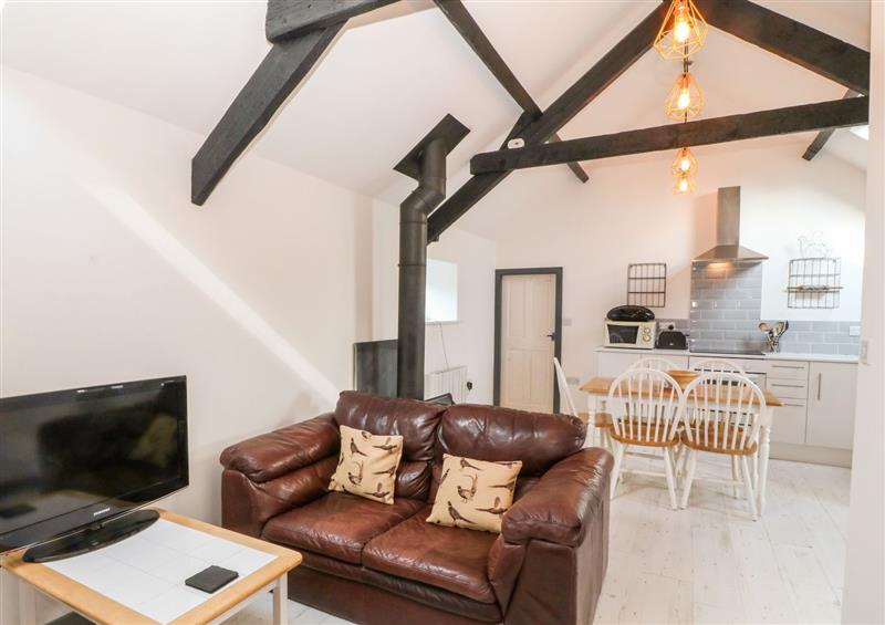 Relax in the living area at Cowshed, Cilan near Abersoch