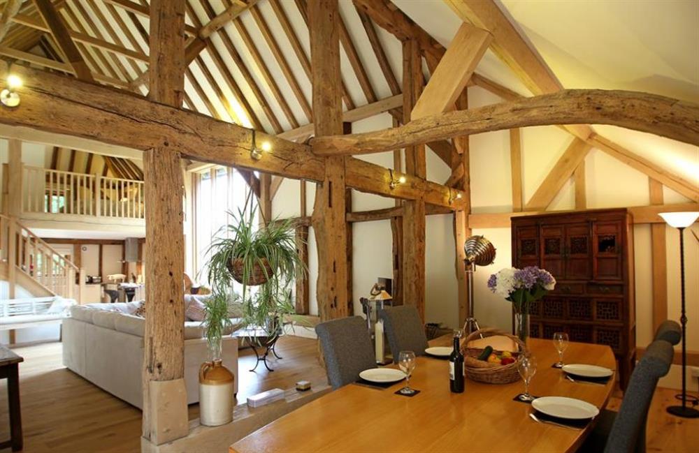 Living room and dining area at Cowshot Barn, Brookwood, Surrey