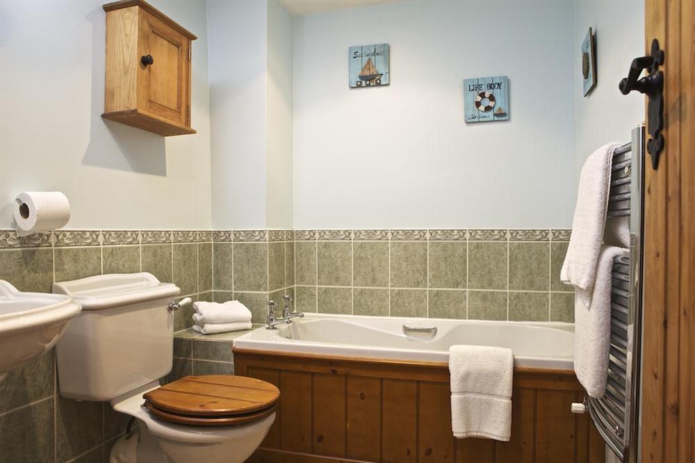 Family bathroom with bath and separate shower at Cowslip Cottage in Frogmore, Nr Kingsbridge