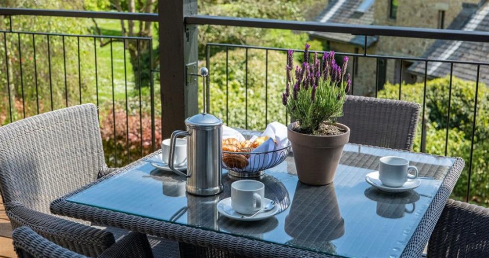 Eat alfresco or enjoy drinks on the decked terrace with views at Cox Tor in Chagford