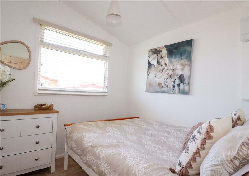 This is a bedroom (photo 2) at Cozy Retreat, Tregolds