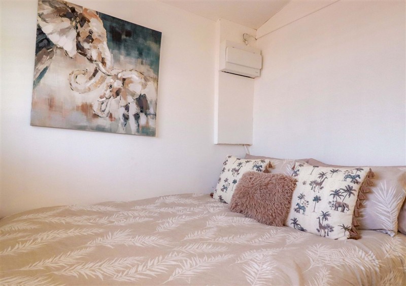 This is a bedroom at Cozy Retreat, Tregolds