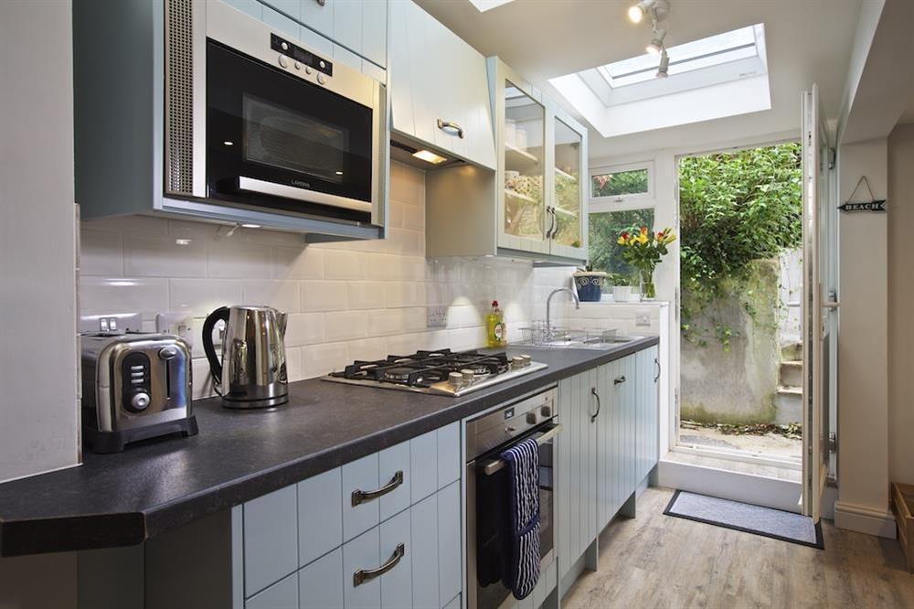 Open-plan kitchen at Crab Cottage in , Salcombe