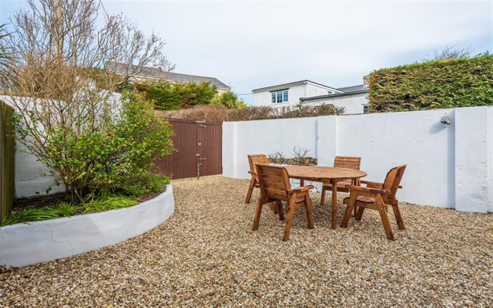 Enclosed gravel courtyard at Crab Cottage in Trevarrian