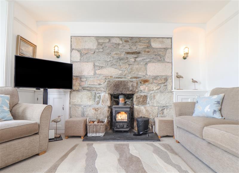 Relax in the living area at Crab Pot Cottage, Porthleven