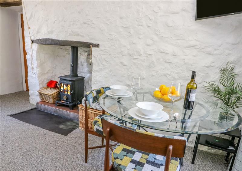 Relax in the living area at Crabapple Cottage, Llanfairfechan