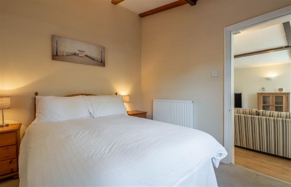 Ground floor: Bedroom two with double bed (photo 2) at Crabpot Cottage, East Runton near Cromer