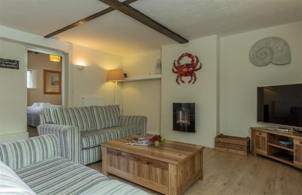 Ground floor: Sitting room area with view to bedroom two at Crabpot Cottage, East Runton near Cromer