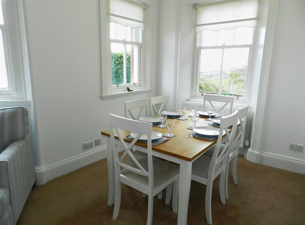Appealing dining area at Craegard House in Corrie, Isle of Arran, Scotland