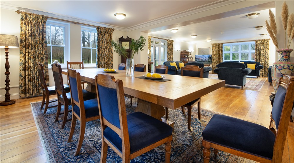 The sitting and dining room at Craflwyn Hall in Caernarfon, Gwynedd