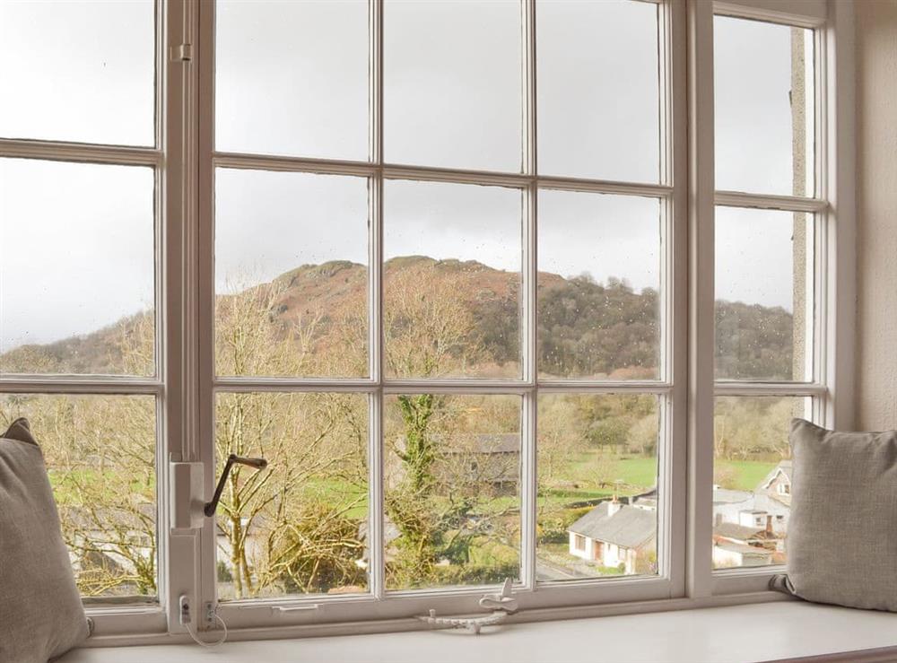 Delightful views of the Lakeland Fells from the bedroom at Crag View in Ambleside, Cumbria