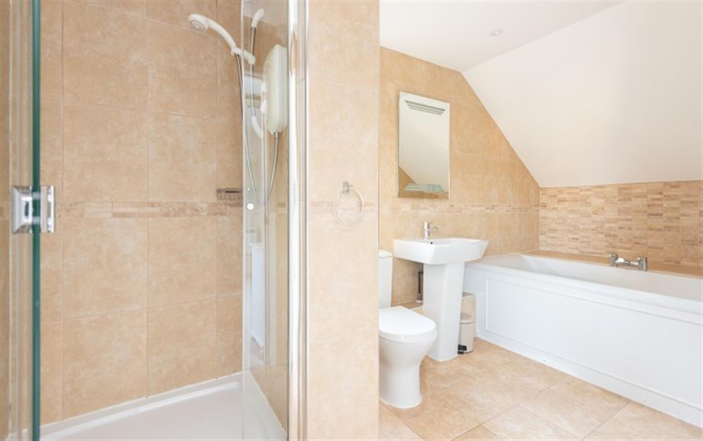 The ensuite featuring the spacious shower cubicle. at Crags 26 Bay View Cottage in Maenporth