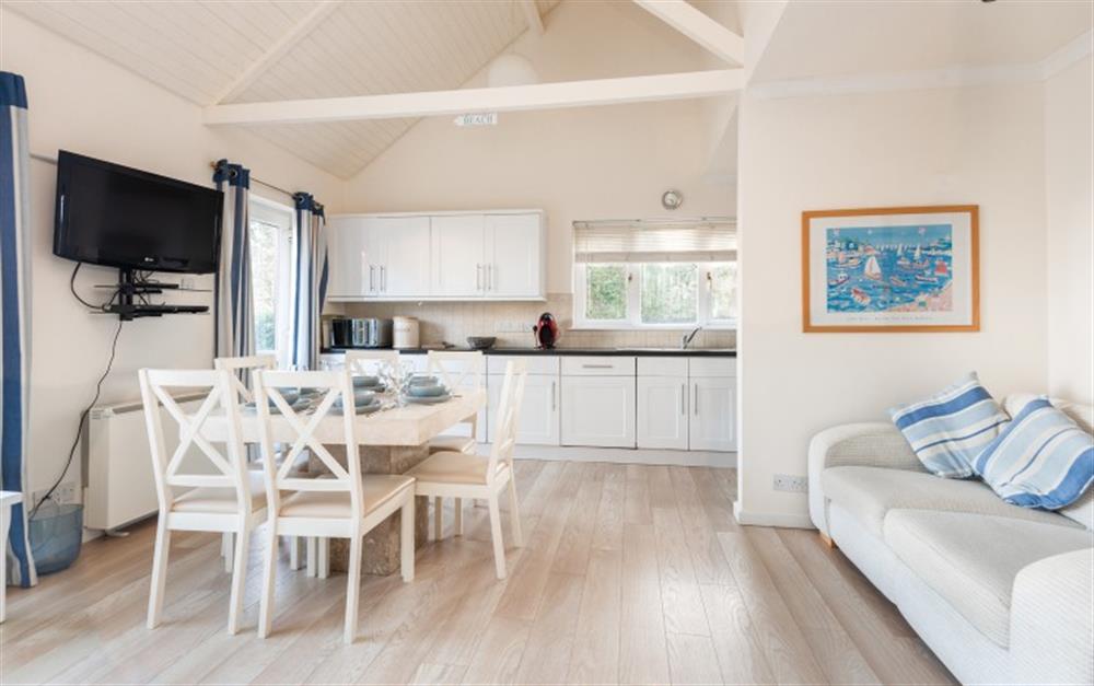 The high vaulted ceiling is perfect for the lower ground floor living area, so light and airy. at Crags 26 Bay View Cottage in Maenporth