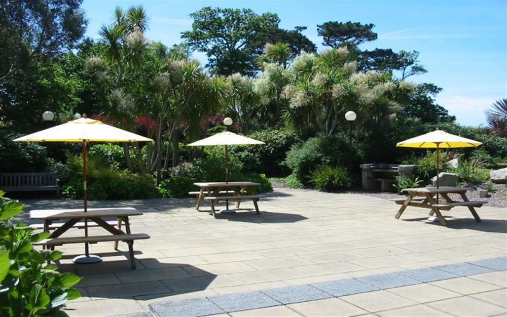 There is a lovely sunny patio outside the leisure centre which has a built in barbeque for everyone's use. at Crags 26 Bay View Cottage in Maenporth