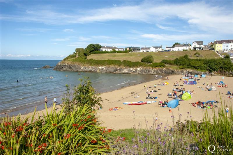 A picturesque fishing village which overlooks two golden sandy beaches and popular with families at Craig Silian, Gwbert