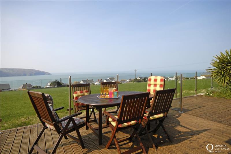 Deck with hot tub and panoramic sea views (photo 2) at Craig Silian, Gwbert