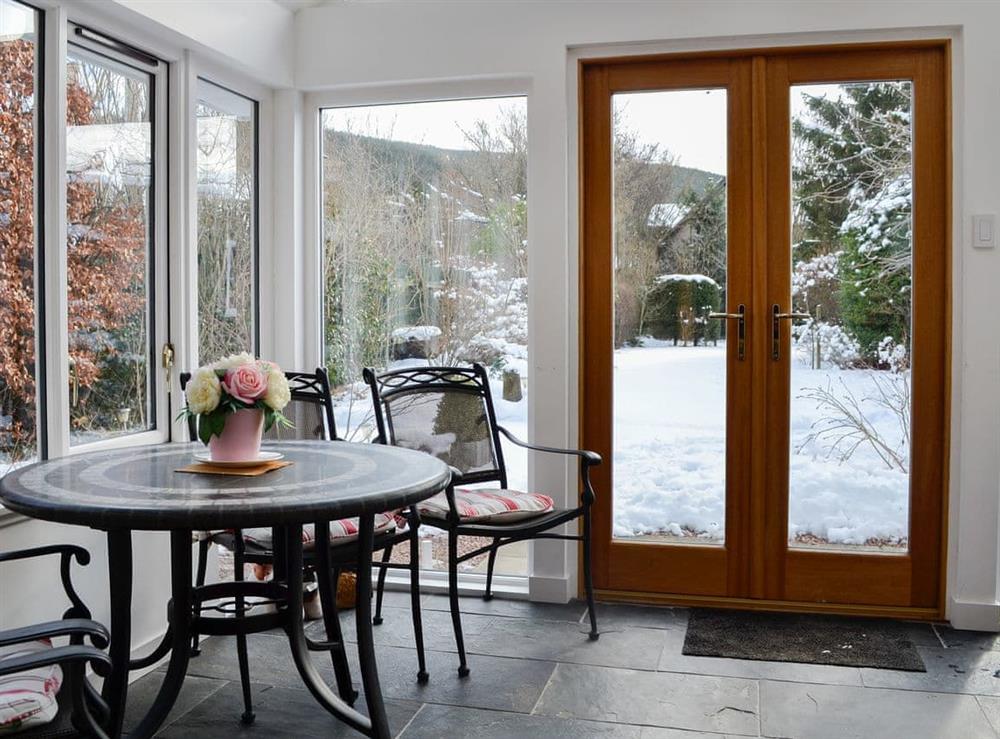 Light and airy conservatory with garden access at Craigclunie in Ballater, Aberdeenshire