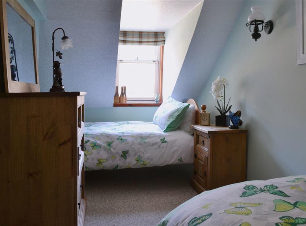 Twin bedroom at Craigdarroch Cottage in Callander, Perthshire
