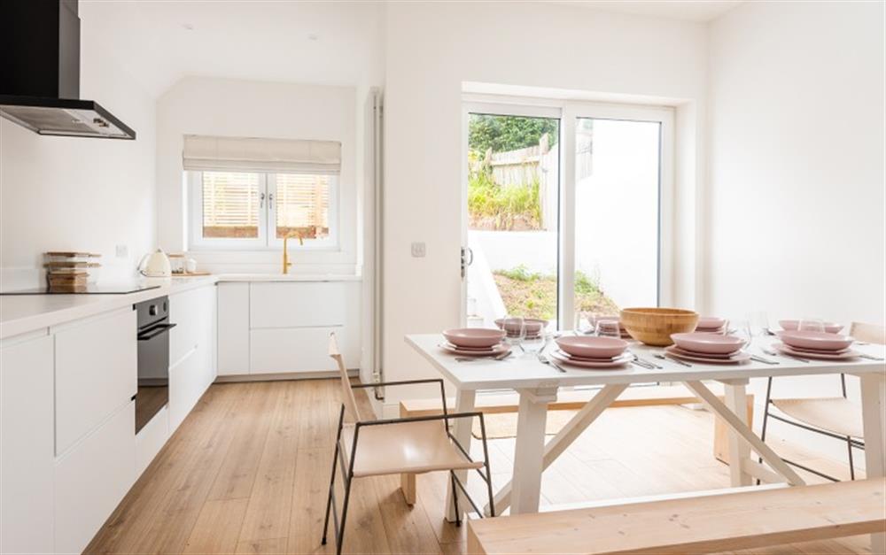 Another view of the open plan kitchen dining area at Craiglands in Salcombe