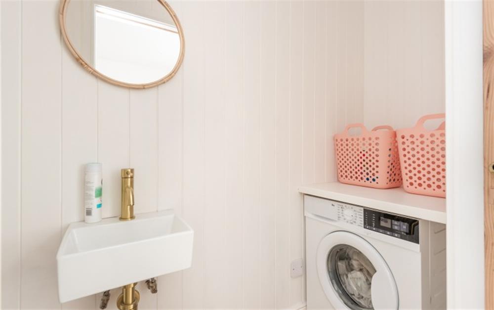 Laundry room with additional WC and basin at Craiglands in Salcombe