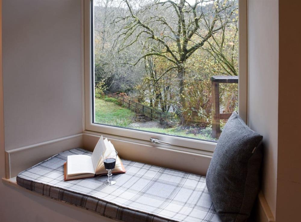Window seat with great views at Craigmuick Cottage in Aberfoyle, Stirlingshire
