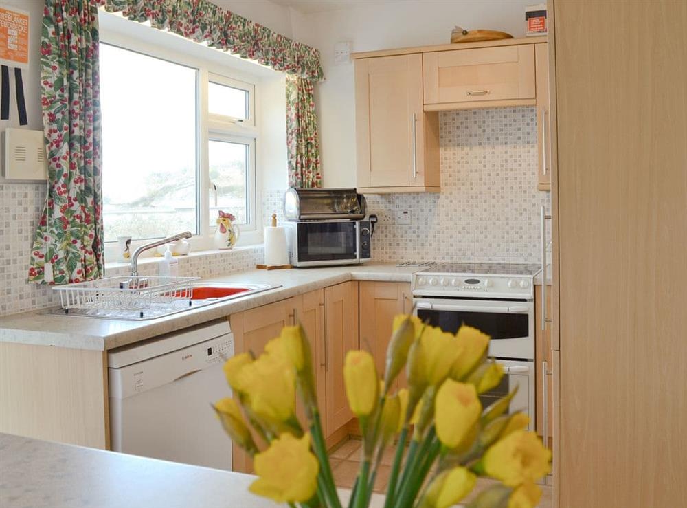 Charming kitchen at Craigneish Bungalow in Trearddur Bay, near Holyhead, Isle of Anglesey, Gwynedd
