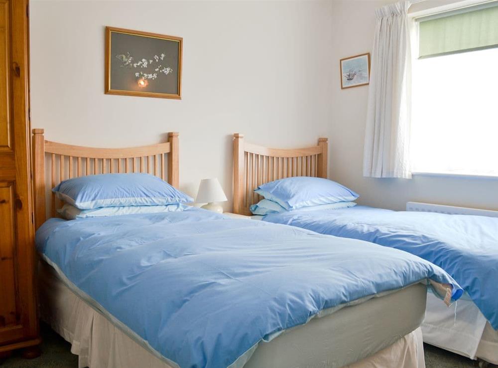 Comfy twin bedroom at Craigneish Bungalow in Trearddur Bay, near Holyhead, Isle of Anglesey, Gwynedd
