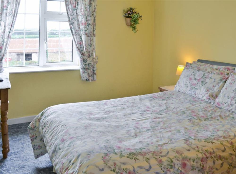 Double bedroom at Craneham Farmhouse in Bideford, Devon