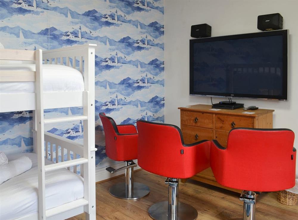 Children’s room with smart tv and games console at Cranford House in Cranford, near Clovelly, Devon