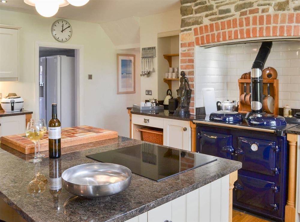 Kitchen area with granite-topped island at Cranford House in Cranford, near Clovelly, Devon