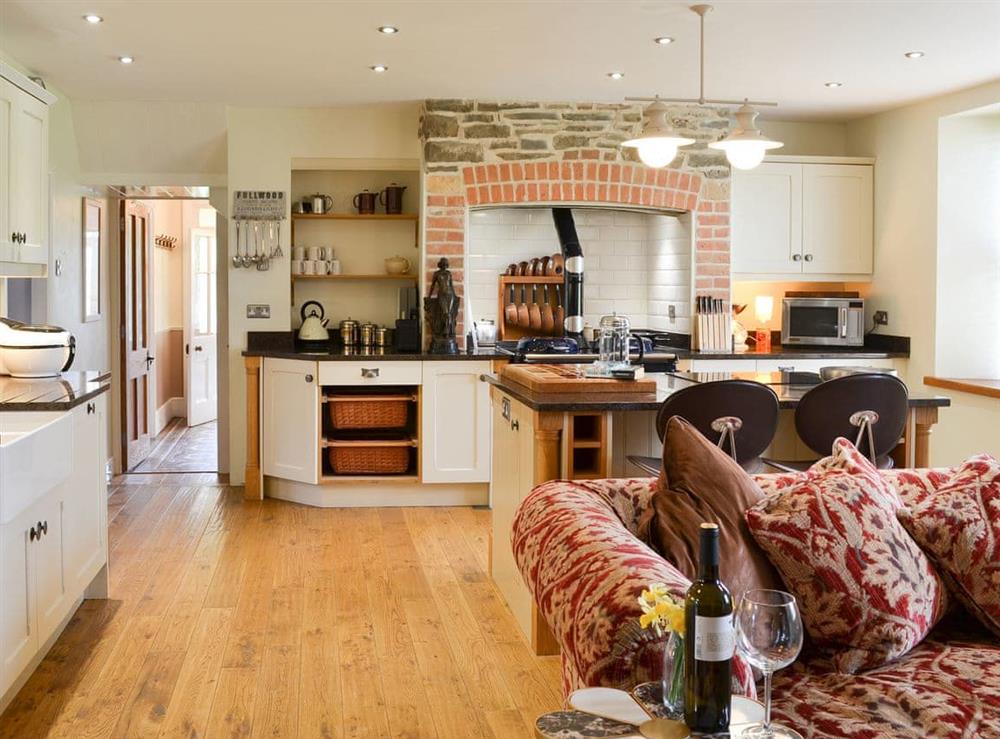 Welcoming family room with breakfast area and kitchen at Cranford House in Cranford, near Clovelly, Devon