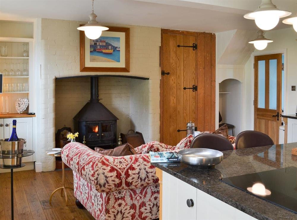 Wooden-floored living area at Cranford House in Cranford, near Clovelly, Devon