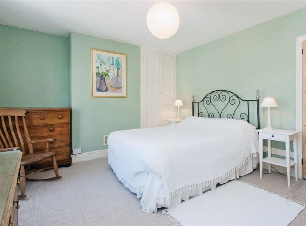 Spacious double bedroom with kingsize bed at Cranmere in Salcombe, Devon
