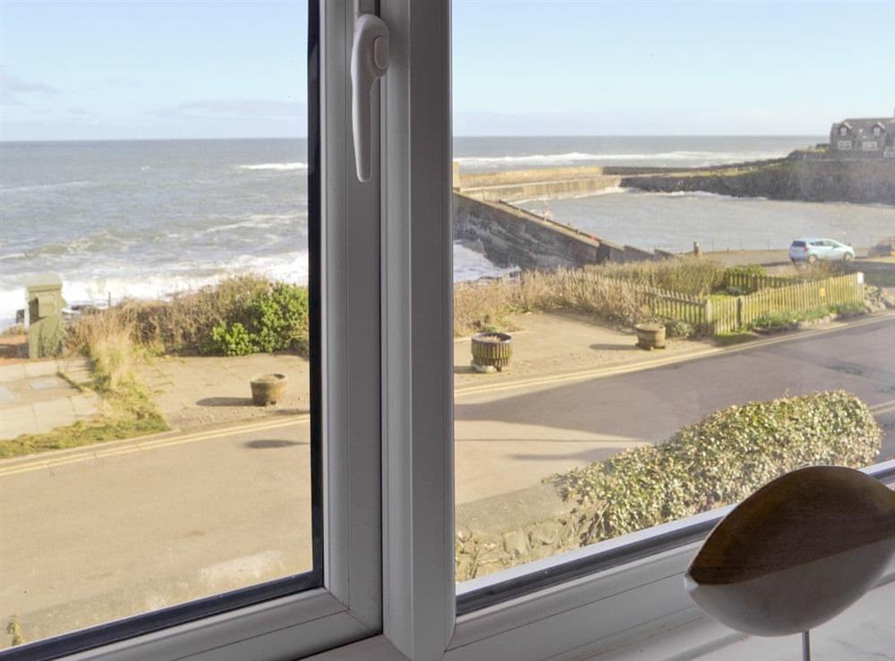 Great views over harbour and coast from double bedroom at Craster View in Craster near Alnwick, Northumberland