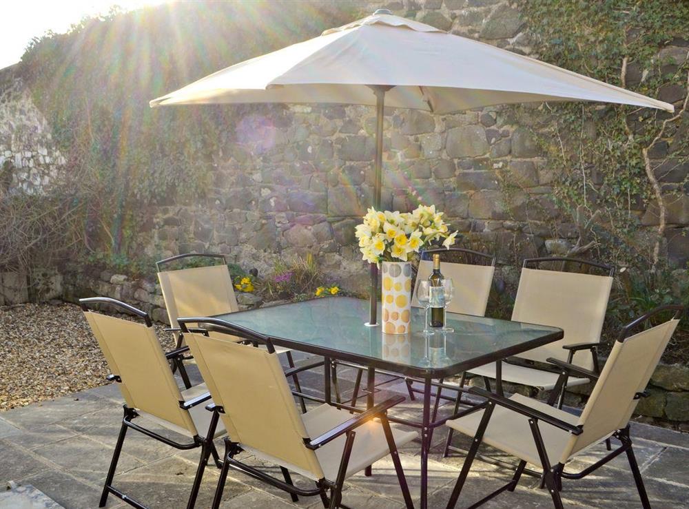 Outdoor eating area on patio at Craster View in Craster near Alnwick, Northumberland