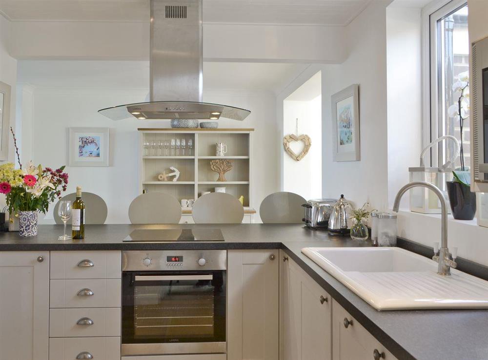 Well-equipped fitted kitchen with breakfast bar at Craster View in Craster near Alnwick, Northumberland