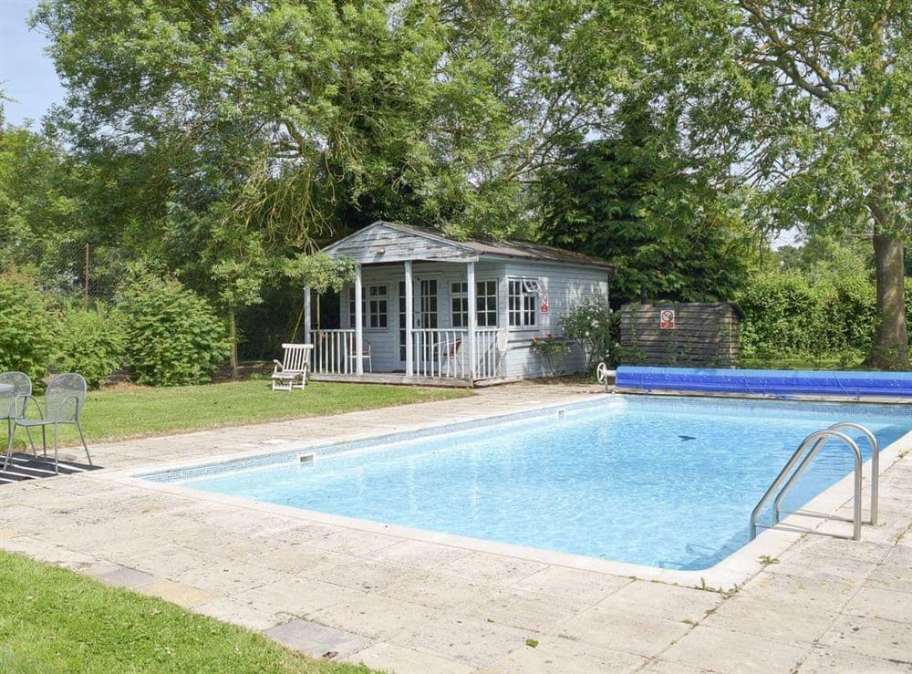 Luxurious outdoor swimming pool at Cravens Manor in Henham, near Southwold, Suffolk