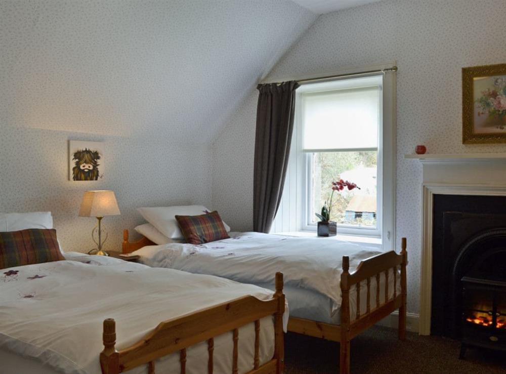 Charming twin bedroom at Creag Darach Cottage in Aberfoyle, near Callander, Stirlingshire, Scotland