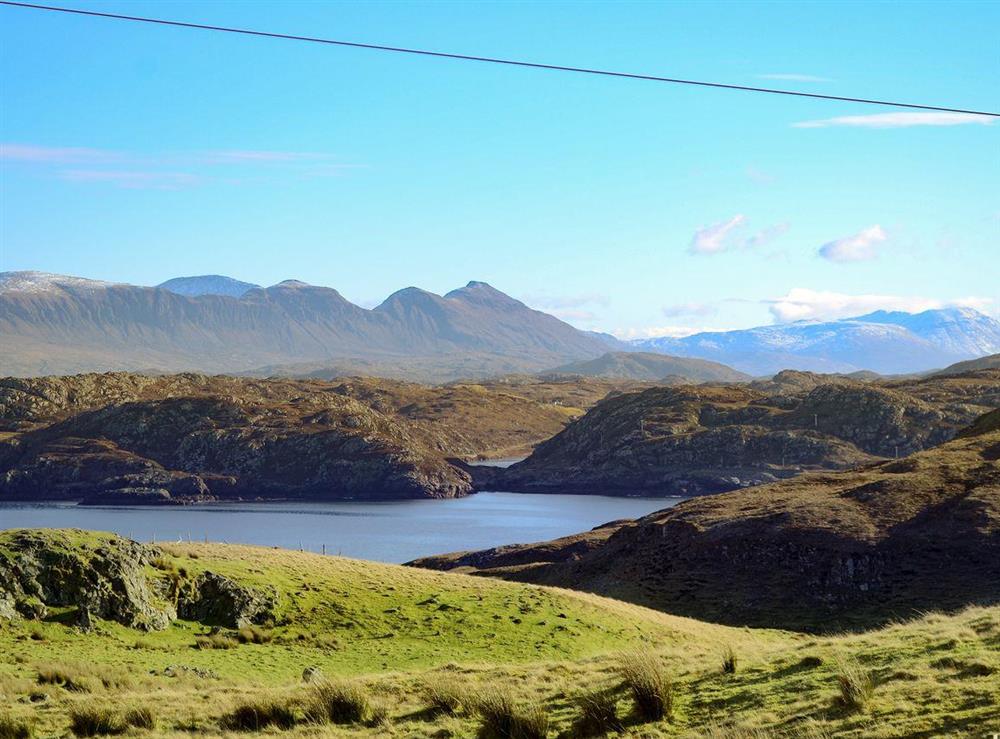 Stunning views of the surrounding mountains and sea at Creagach in Achnacarnin, near Lochinver, Highlands, Sutherland