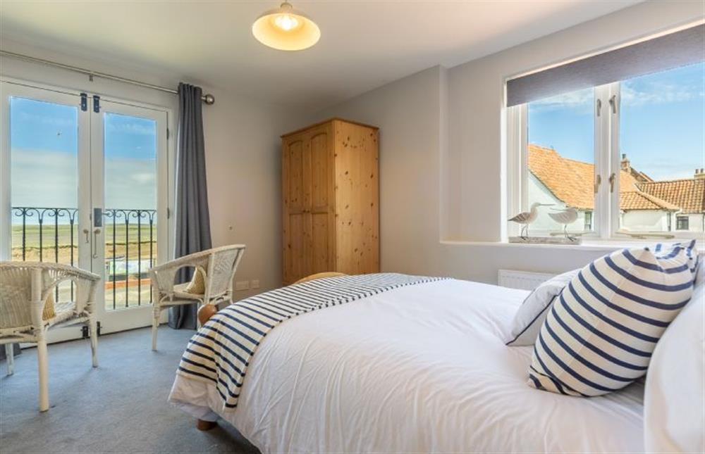 First floor: Double aspect bedroom with spectacular views at Creek Cottage, Wells-next-the-Sea