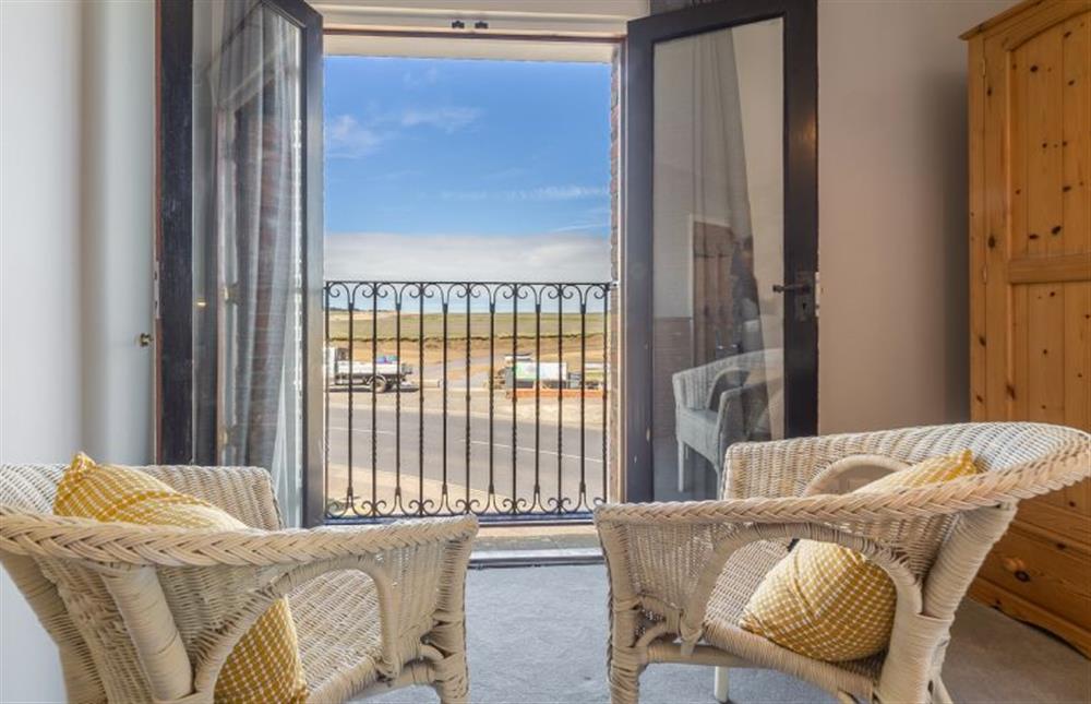 First floor: Great views from the master bedroom at Creek Cottage, Wells-next-the-Sea