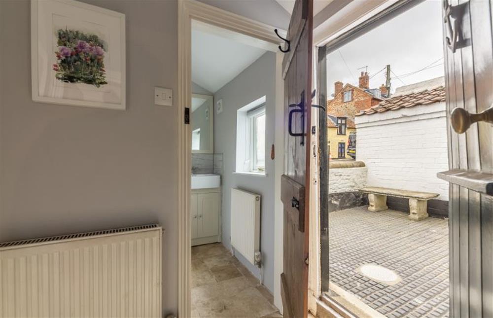Ground floor: Bathroom and courtyard at Creek Cottage, Wells-next-the-Sea
