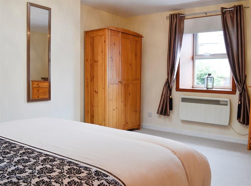 Spacious double bedroom at Creel Cottage in Auchmithie, near Arbroath, Angus