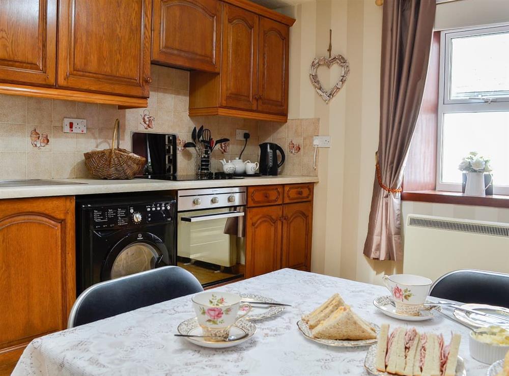 Well-appointed kitchen dining room at Creel Cottage in Auchmithie, near Arbroath, Angus